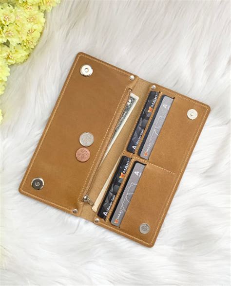 Women's Designer Leather Wallets in Bifold & Trifold .